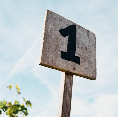 Wooden harvest marking sign, showing number 1.